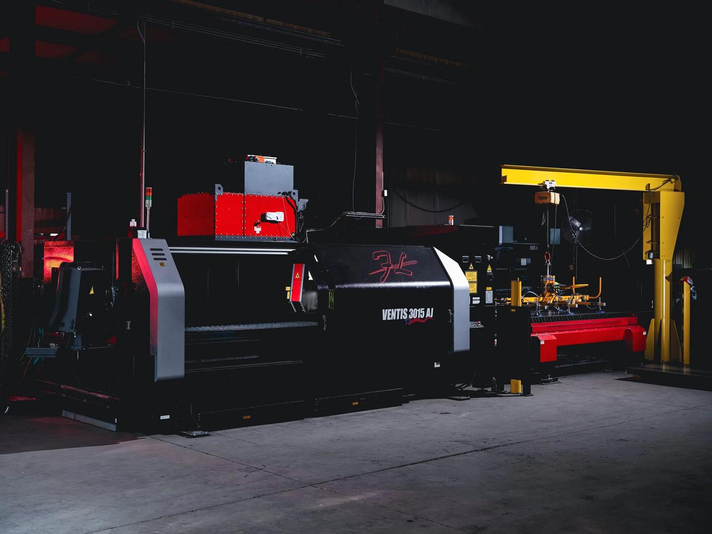 The KanCraft shop floor with the fiber laser and material handling crane